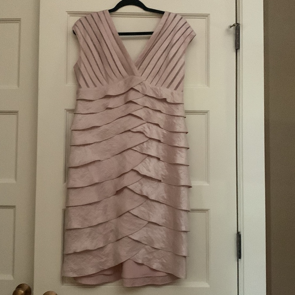 Beautiful pink shimmering cocktail dress. size 14, looks terrific on